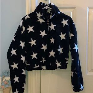 Cropped Sweatshirt that has stars on it.